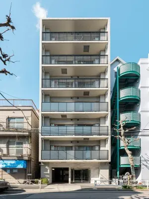an apartment building with balconies on the side of it at Artessimo \u62bc\u4e0a604 in Tokyo
