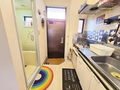 a small bathroom with a sink and a shower at Airport and Disney direct bus Near Koiwa station in Tokyo