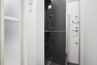 a bathroom with a shower with a glass door at THE Dorchester β in Tokyo