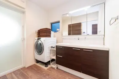 a bathroom with a washing machine and a sink at KR family terrace in Tokyo