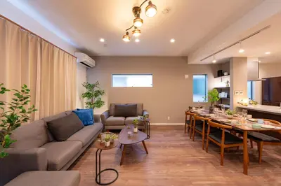 a living room with a couch and a table at KR family terrace in Tokyo