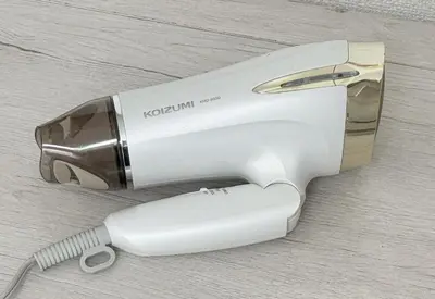 a hair dryer sitting on top of a table at \u30a2\u30b9\u30d4\u30a2403 in Tokyo