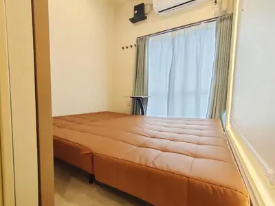 a bed in a room with a large window at C8 Shinjuku JR St 8 mins 2 bedrooms and 1 living room Max 5P Direct to Shinjuku Ueno Ginza Shibuya Ikebukuro Yoyogi Shinagawa \u65b0\u5bbf\u533a \u9ad8\u7530\u9a6c\u573a\u8f66\u7ad98\u5206\u949f \u4e24\u5ba4\u4e00\u5385 \u6700\u59275\u4eba in Tokyo