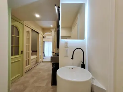 a bathroom with a white sink and a faucet at D8 Shinjuku JR St 8 mins 2 bedrooms and 1 living room Max 5P Direct to Shinjuku Ueno Ginza Shibuya Ikebukuro Yoyogi Shinagawa \u65b0\u5bbf\u533a \u9ad8\u7530\u9a6c\u573a\u8f66\u7ad98\u5206\u949f \u4e24\u5ba4\u4e00\u5385 \u6700\u59275\u4eba in Tokyo