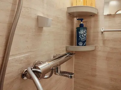 a bathroom sink with a faucet and a bottle of soap at D2 Shinjuku JR St 8 mins 2 bedrooms and 1 living room Max 5P Direct to Shinjuku Ueno Ginza Shibuya Ikebukuro Yoyogi Shinagawa \u65b0\u5bbf\u533a \u9ad8\u7530\u9a6c\u573a\u8f66\u7ad98\u5206\u949f \u4e24\u5ba4\u4e00\u5385 \u6700\u59275\u4eba in Tokyo