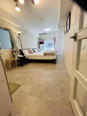 a bedroom with a large bed in a room at The Bella Ueno in Tokyo