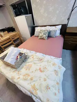 a bedroom with a bed in a room at The Bella Ueno in Tokyo
