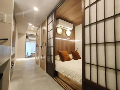 a small bedroom with a bed in a room at B6 Shinjuku JR St 8 mins 2 bedrooms and 1 living room Max 5P Direct to Shinjuku Ueno Ginza Shibuya Ikebukuro Yoyogi Shinagawa \u65b0\u5bbf\u533a \u9ad8\u7530\u9a6c\u573a\u8f66\u7ad98\u5206\u949f \u4e24\u5ba4\u4e00\u5385 \u6700\u59275\u4eba in Tokyo