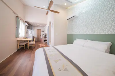 a bedroom with a bed and a desk in it at GOOD DAY Shinagawa HOTEL in Tokyo