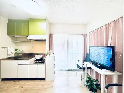 a kitchen with a desk with a computer on it at Ikebukuro-hostel池袋中川301&501-TS0038 in Tokyo