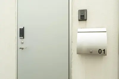 a door with a mailbox on the side of it at Designer condo close to Asakusa, Tokyo Skytree in Tokyo