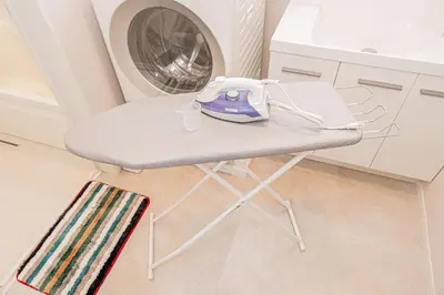 a washing machine sitting on a table in a kitchen at Private 3 Bedroom House with Free Parking Near Asakusa and Skytree in Tokyo
