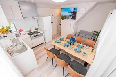 a kitchen and dining room with a table and chairs at Private 3 Bedroom House with Free Parking Near Asakusa and Skytree in Tokyo