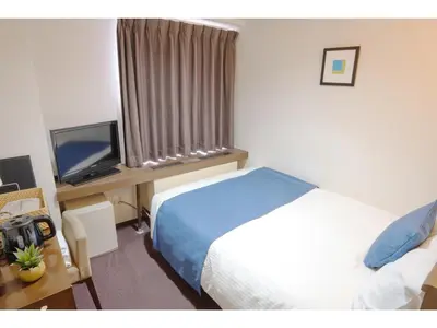 a hotel room with a bed and a television at POD SELECT HOTEL SHINJUKU - Vacation STAY 43665v in Tokyo