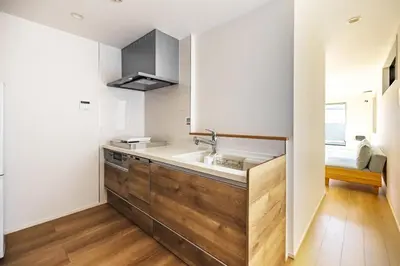 a kitchen with a sink and a counter at JR yamanote line ikebukuro in Tokyo