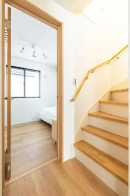 a room with stairs leading to a bedroom at JR yamanote line ikebukuro in Tokyo