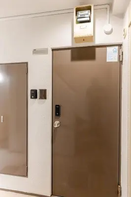 an elevator in a hospital room with a door at rot\u6771\u4e0a\u91ce3\u4e01\u76ee302 in Tokyo