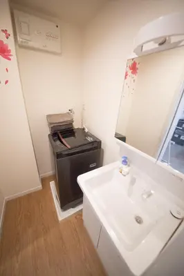 a bathroom with a sink and a stove at \u685c\u5c4bSakuraya101 in Tokyo