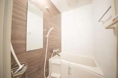 a bathroom with a shower and a sink and a mirror at \u685c\u5c4bSakuraya101 in Tokyo