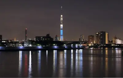 a view of a city at night with the spire at Near Asakusa, 5-min from Station, 5BR 150 square meters House, Near Skytree in Tokyo