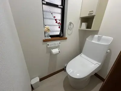 a bathroom with a white toilet and a window at Near Asakusa, 5-min from Station, 5BR 150 square meters House, Near Skytree in Tokyo