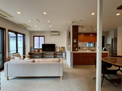 a living room with a couch and a table at and CITY\u4e09\u8ed2\u8336\u5c4b in Tokyo