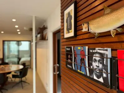a wall with a picture of a fish on it at and CITY\u4e09\u8ed2\u8336\u5c4b in Tokyo