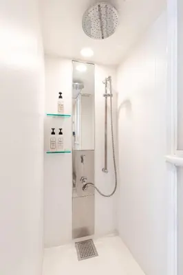 a white bathroom with a shower with a sink at rot\u6771\u4e0a\u91ce3\u4e01\u76ee501 in Tokyo