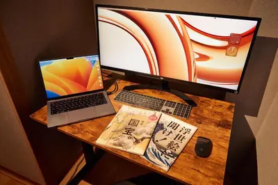 a desk with a computer monitor and a laptop at \u4e80\u4e43\u5eb5Kamenoan in Tokyo