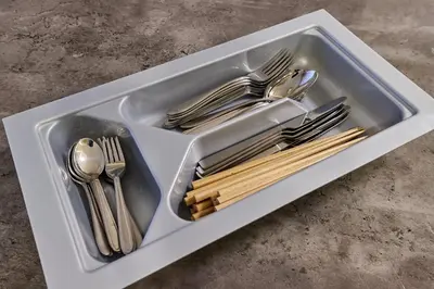 a tray with silver utensils and forks and spoons at tkm\u5143\u9ebb\u5e033\u4e01\u76ee102 in Tokyo