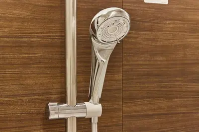 a glass door handle on a wooden door at tkm\u5143\u9ebb\u5e033\u4e01\u76ee102 in Tokyo
