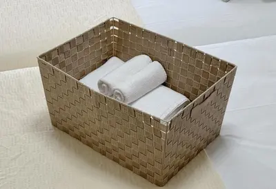 a box filled with white towels on a table at \u30a2\u30b9\u30d4\u30a2503 in Tokyo
