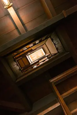 an overhead view of a ceiling with a light at Ebihara in Tokyo