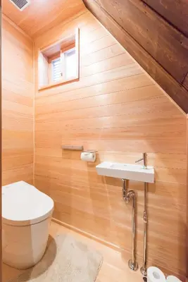 a bathroom with a toilet and a sink at Ebihara in Tokyo