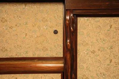 a wooden door with a floral pattern on it at Ebihara in Tokyo