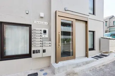 a door on the side of a building at \u30aa\u30fc\u30af\u30d6\u30e9\u30f3\u30ab\u5e61\u30f6\u8c37 in Tokyo