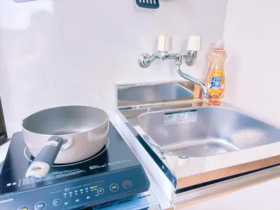 a kitchen with a sink and a pot on a scale at 501, Near Shinjuku, JR Sobu Line, Elevator available, \u65b0\u5bbf\u7ad92\u7ad9\u53ef\u8fbe,\u79cb\u53f6\u539f \u516d\u672c\u6728 \u4e0a\u91ce \u7b51\u5730\u5e02\u573a\u53ef\u76f4\u8fbe,\u6709\u7535\u68af,3\u6761\u5730\u94c1\u53ef\u7528 in Tokyo