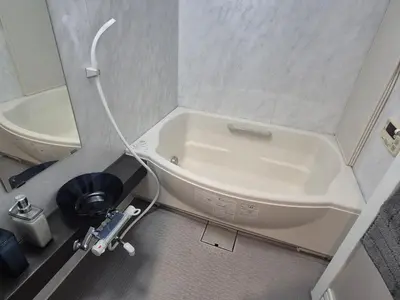 a bathroom with a toilet and a bath tub at shibuya square 11F Shibuya Scramble Crossing near in Tokyo