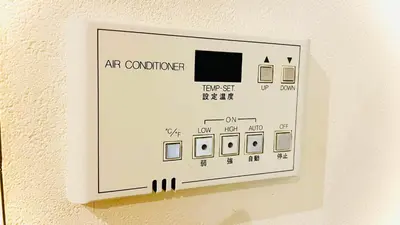 an art controller on the wall of a room at \u30db\u30c6\u30eb\u30b5\u30fc\u30d6\u6e0b\u8c37 in Tokyo