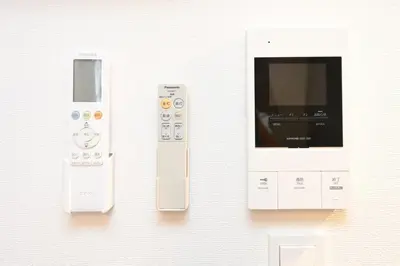 a nintendo wii controller and a video game system at Evergreen hotel ichigaya in Tokyo