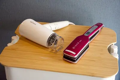 a table with a wii remote and a remote control at M&T stay in Tokyo