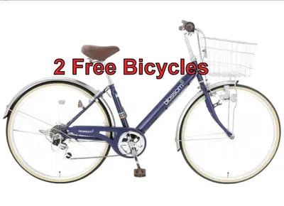 a blue bike with a basket and the words free bicycles at Home Tokyo Takinogawa in Tokyo
