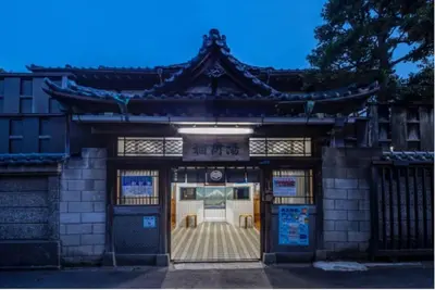 an entrance to a building with a door at Home Tokyo Takinogawa in Tokyo