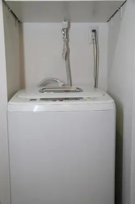 a washing machine with a sink on top of it at Pr22 \u4e0b\u843d\u5408 in Tokyo