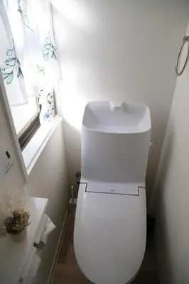 a white toilet in a bathroom with a window at Pr31\u4e0b\u843d\u5408 in Tokyo