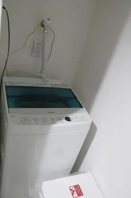 a toilet with a tank on top of it at Pr31\u4e0b\u843d\u5408 in Tokyo