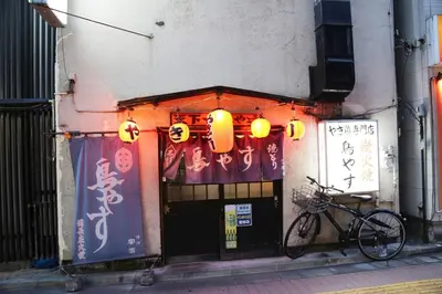 a bike parked in front of a building at Pr34\u4e0b\u843d\u5408 in Tokyo