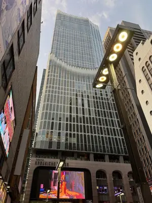 a tall building with a sign in front of it at Pr35\u4e0b\u843d\u5408 in Tokyo