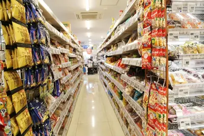 a aisle of a grocery store filled with food at Pr35\u4e0b\u843d\u5408 in Tokyo