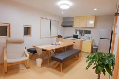 a kitchen with a table and a dining room at \u4e0a\u91ce \u79cb\u8449\u539f \u30a8\u30ea\u30a2 5LDK \u30c8\u30a4\u30ec3\u7b87\u6240 \u6d74\u5ba42\u7b87\u6240 \u30ad\u30c3\u30c1\u30f3 \u30c6\u30e9\u30b9\u3042\u308a\u8cb8\u5207\u4e00\u8ed2\u5bb6a in Tokyo